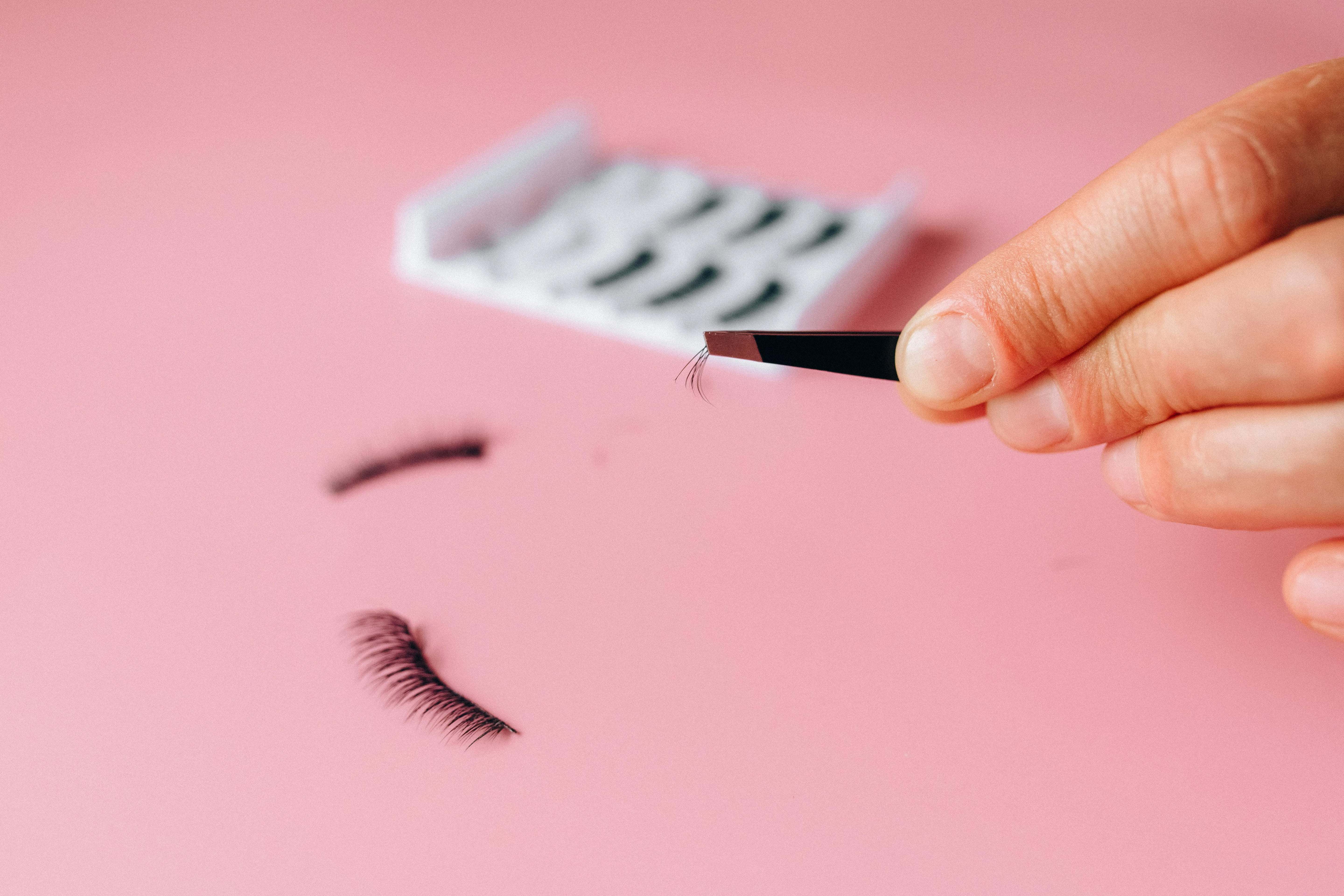 Close up of Eyelashes in Tweezers